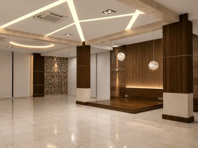 Open hall with walnut-clad columns, a mosaic feature wall, crossing cove-light lines in the ceiling and glass pendant lights